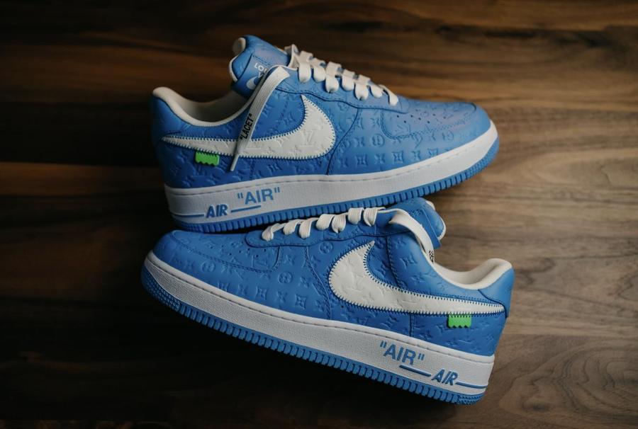 A pair of sneakers on a wood table